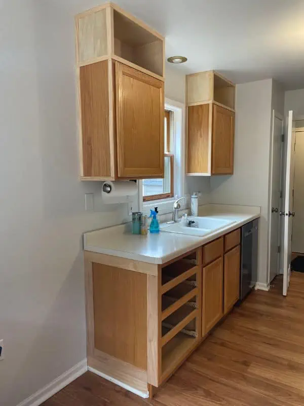 Upper kitchen cabinets extended to the ceiling with new cabinet boxes for extra storage