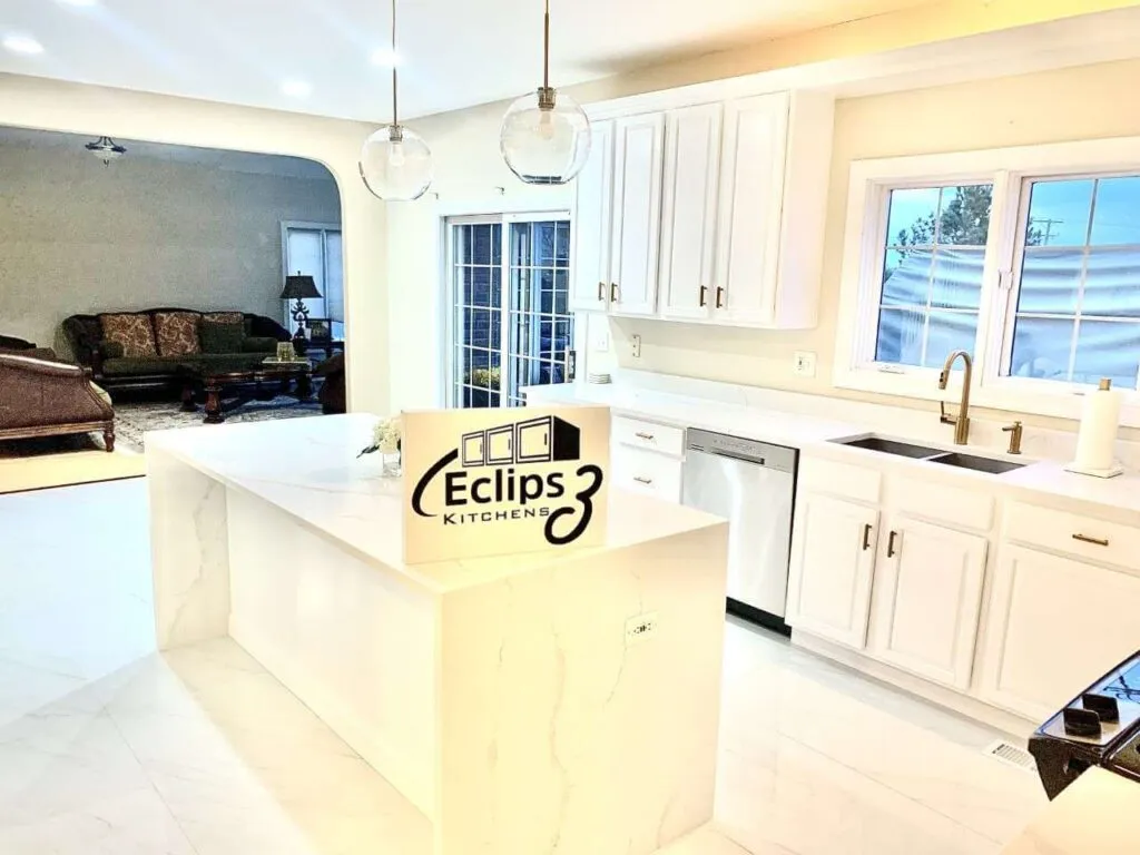 White painted kitchen cabinets and marble island refinished by Eclips3