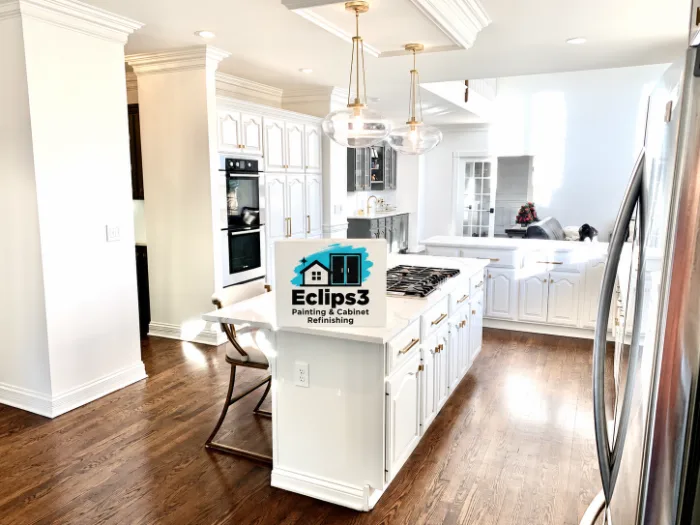 Refaced white kitchen cabinets and island with new doors and drawer fronts