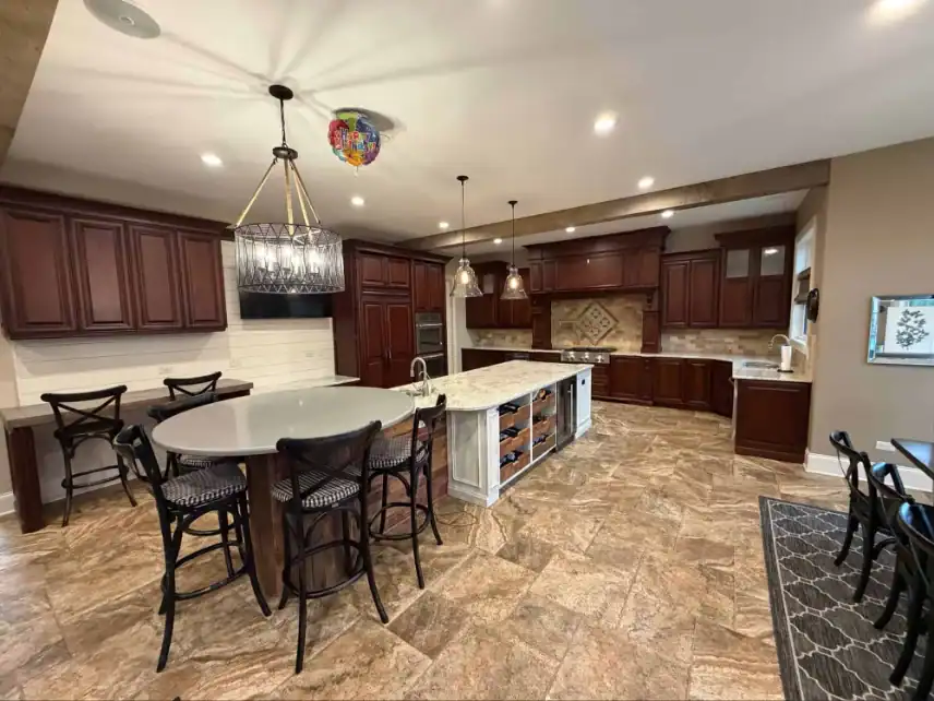 Before: the same kitchen with dark cherry cabinets