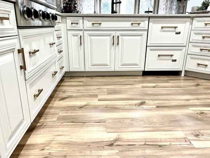 Close-up of refinished white cabinet doors and drawers